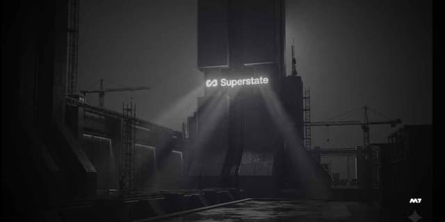 Superstate logo embossed on a dark building surface representing institutional finance and tokenization.