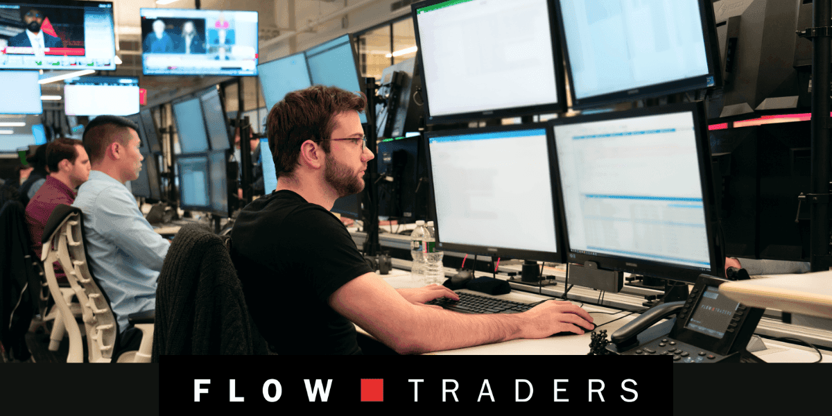 flowtraders dealing desk and logo